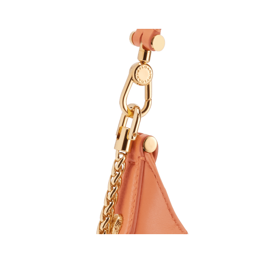 Serpenti Ellipse small crossbody bag in coral carnelian orange Urban grained calf leather with silky coral pink grosgrain lining. Captivating snakehead closure in gold-plated brass embellished with black onyx scales and red enamel eyes. 1204-UCLb image 5