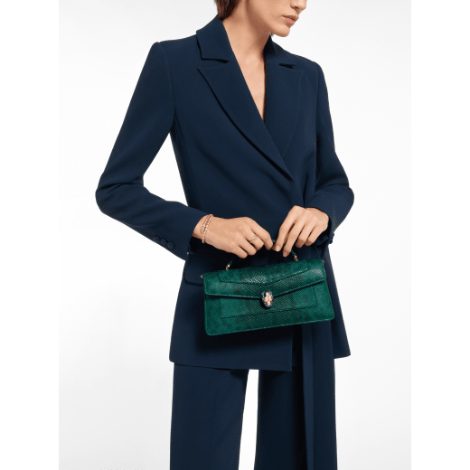Serpenti Forever Elongated top handle bag in forest emerald shiny karung with black nappa leather lining. Captivating snakehead magnetic closure in gold-plated brass embellished with forest emerald enamel and gold-plated brass scales, and black onyx eyes. 295674 image 1