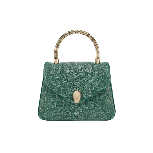 Serpenti Reverse small top handle bag in soft emerald green galuchat skin with amethyst purple nappa leather lining. Captivating magnetic snakehead closure in light gold-plated brass embellished with red enamel eyes. 1234-SG image 1
