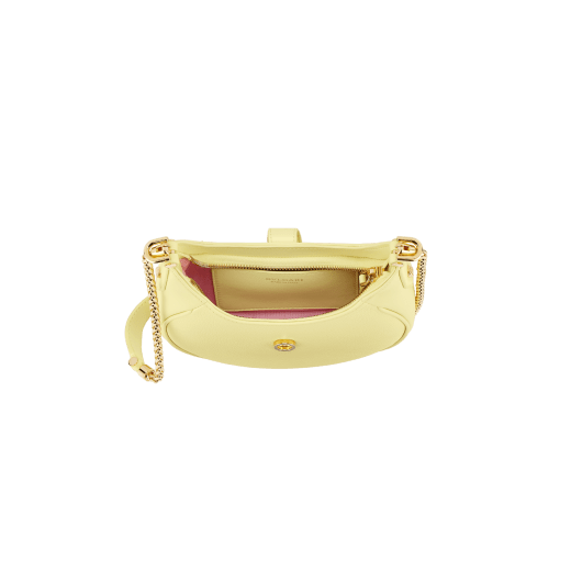 Serpenti Ellipse small crossbody bag in Urban grain and smooth flamingo quartz pink calf leather with flamingo quartz pink grosgrain lining. Captivating snakehead closure in gold-plated brass embellished with black onyx scales and red enamel eyes. Exclusive online color. 1204-UCLa image 3