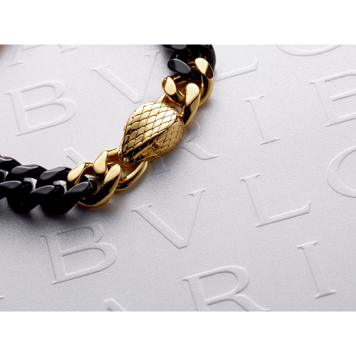 Serpenti Forever Maxi Chain bracelet in gold-plated brass with partial black enamel. Captivating snakehead embellishment with red enamel eyes in the middle, and adjustable closure. SERP-CHUNKYCHAINa image 3
