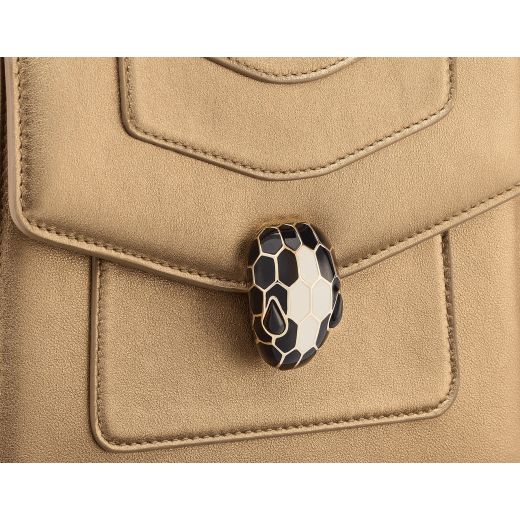 Serpenti Forever small top handle bag in white agate calf leather with heather amethyst fuchsia grosgrain lining. Captivating snakehead closure in light gold-plated brass embellished with black and white agate enamel scales and green malachite eyes. 1122-CLa image 9