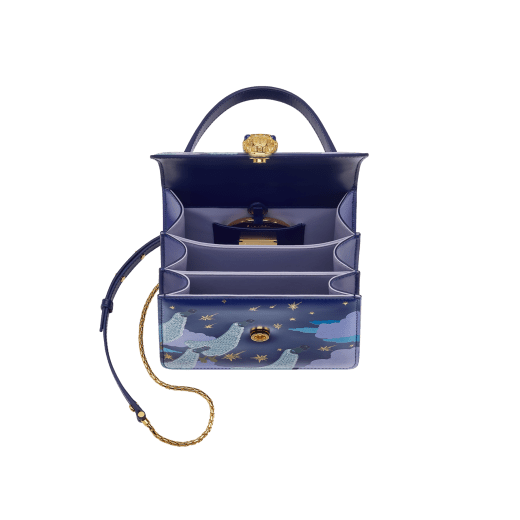 Sunwoo Kim x Bvlgari Serpenti Forever Night small top handle bag in midnight blue calf leather with nocturnal landscape print envisioned by the artist; cobalt blue calf leather sides and lavender lilac nappa leather lining. Captivating snakehead magnetic closure in gold-plated brass embellished with diamond-cut engraving on the scales, and blue lapis lazuli eyes. Limited Edition. 752-SunwooKim image 4