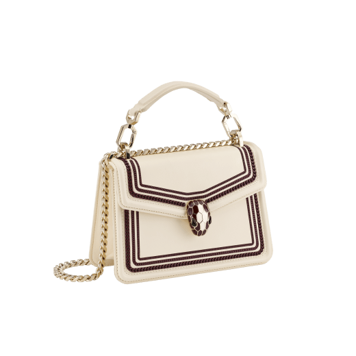 “Serpenti Diamond Blast” crossbody bag in Ivory Opal white smooth calf leather, featuring an Deep Garnet bordeaux 3-Maxi Chain motif, with Deep Garnet bordeaux nappa leather internal lining. Tempting snakehead closure in light gold plated brass, enriched with Deep Garnet bordeaux and Ivory Opal white enamel and black onyx eyes. 291175 image 2