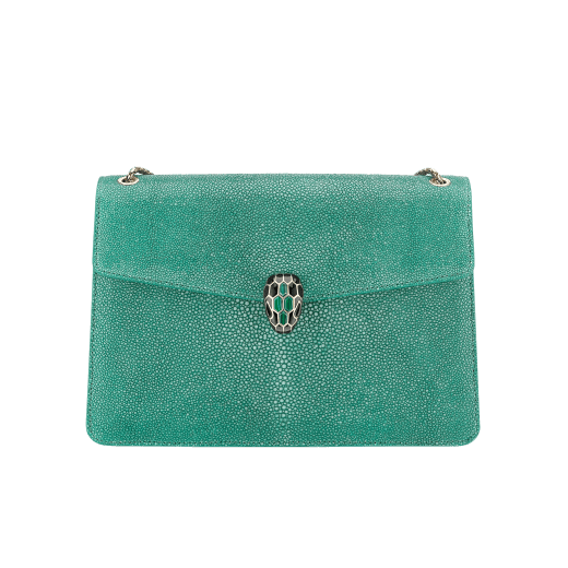 “Serpenti Forever” shoulder bag in emerald green galuchat skin. Iconic snake head closure in light gold plated brass enriched with black enamel, malachite scales and black onyx eyes. 289026 image 1