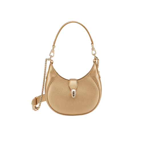 Serpenti Ellipse small crossbody bag in Urban grain and smooth ivory opal calf leather with flamingo quartz pink grosgrain lining. Captivating snakehead closure in gold-plated brass embellished with black onyx scales and red enamel eyes. 1204-UCL image 1