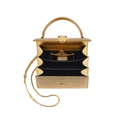 Serpenti Forever top handle bag in gold galuchat skin with black nappa leather lining. Captivating snakehead closure in gold-plated brass embellished with satin-gold scales and black onyx eyes. 752-FG image 4
