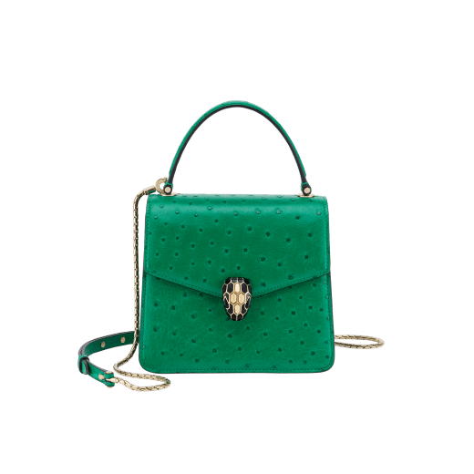 Serpenti Forever small top handle bag in vivid emerald green shiny ostrich skin with emerald green nappa leather lining. Captivating snakehead magnetic closure in light gold-plated brass embellished with black enamel and light gold-plated brass scales, and black onyx eyes. 293264 image 1