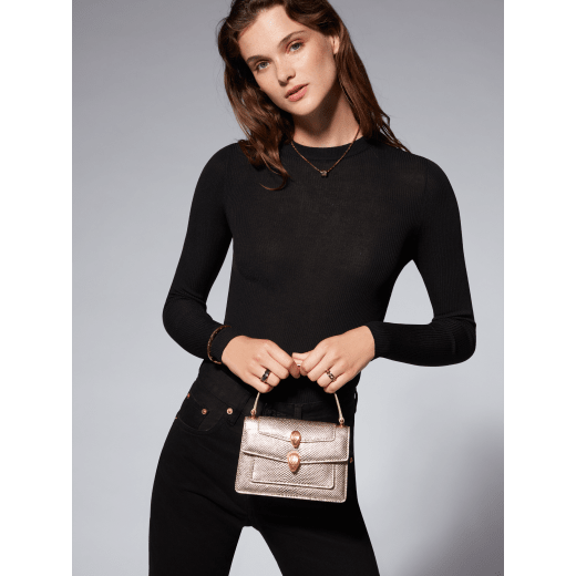Alexander Wang x Bvlgari belt bag in light gold Molten karung skin with black nappa leather lining. Exclusively redesigned double Serpenti head clasp in antique gold-plated brass with seductive red enamel eyes. 291188 image 7
