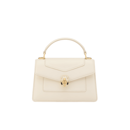 Serpenti Forever mini top handle bag in royal ruby calf leather with royal ruby nappa leather lining. Captivating snakehead magnetic closure in gold-plated brass embellished with royal ruby enamel and gold-plated brass scales, and black onyx eyes. SEA-001-1283XS image 1
