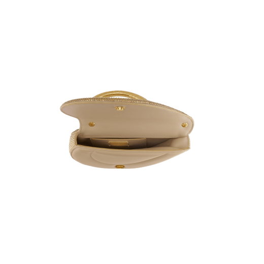 Serpenti Cuore 1968 top handle bag with gold Neige Pavé Crystals applied on a suede base and bright travertino nappa internal lining. Captivating snake body-shaped top handle in gold-plated brass embellished with engraved scales and zirconia eyes; press-button closure. SRN-001-1326S-CRYS image 4