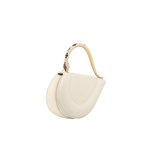 Serpenti Cuore 1968 top handle bag in star rose pink calf leather with crystal rose nappa leather lining. Captivating snake body-shaped top handle in gold-plated brass embellished with star rose pink enamel scales and zirconia eyes; press-button closure. SRN-001-1326S image 2