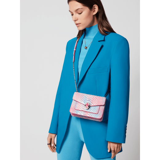 Serpenti Forever small crossbody bag in multicolour Spring Shade python skin with azalea quartz pink nappa leather lining. Captivating magnetic snakehead closure in light gold-plated brass embellished with ivory opal and azalea quartz pink enamel scales and black onyx eyes. 292138 image 6