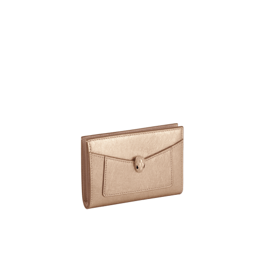 Serpenti Forever folded card holder in light gold Striated calf leather with linen agate nappa leather interior. Captivating snakehead décor in light gold-plated brass embellished with champagne enamel and light gold-plated brass scales, and black enamel eyes; press-button closure. SEA-CC-HOLD-FOLD-R image 1