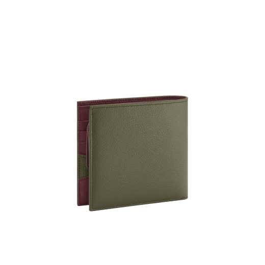 BULGARI BULGARI Man compact wallet in black Urban grain calf leather with forest emerald green Urban grain calf leather interior. Iconic dark ruthenium plated-brass décor enamelled in matte black, and folded closure. BBM-WLTITALASYMa image 3