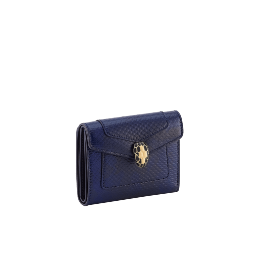 Serpenti Forever compact wallet in shiny midnight plum karung with black nappa leather interior. Captivating snakehead press-button closure in palladium-plated brass embellished with midnight plum enamel and palladium-plated brass scales and black enamel eyes. SEA-SLIM-COMPACT-R-kar image 1