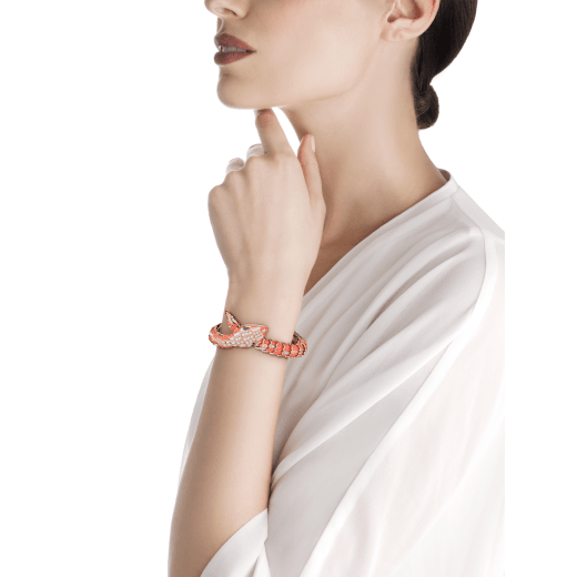 Serpenti Secret Watch with 18 kt rose gold head and single spiral bracelet, both set with brilliant cut diamonds, coral and mother-of-pearl elements, sapphire eyes and 18 kt rose gold dial set with brilliant cut diamonds and mother-of-pearl. 102534 image 4