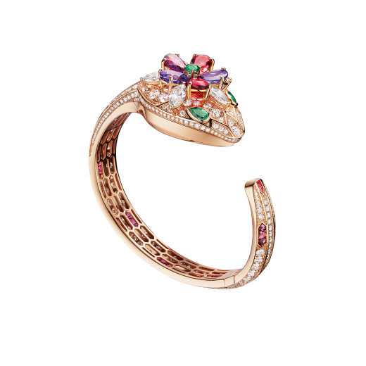 Serpenti Seduttori watch with 18 kt rose gold head set with brilliant cut and navette cut diamonds, pear shaped rubellite, tourmaline, tanzanite and violet garnets, one round cut emerald and two emerald eyes, 18 kt rose gold case, 18 kt rose gold dial set with brilliant cut diamonds, 18 kt rose gold bracelet set with brilliant cut diamonds and baguette tourmalines. 102823 image 1