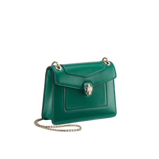 Serpenti Forever Day-to-Night small shoulder bag in emerald green calf leather with black nappa leather lining. Captivating snakehead magnetic closure in light gold-plated brass embellished with deep jade intense green enamel and light gold-plated brass scales, and black onyx eyes. SEA-1281-CL image 2