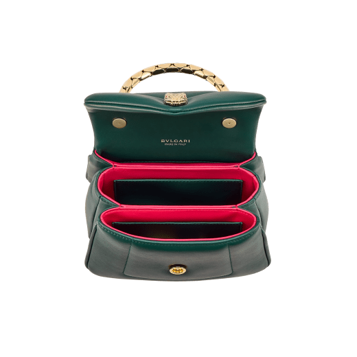Serpenti Reverse small top handle bag in black quilted Metropolitan calf leather with black nappa leather lining. Captivating snakehead magnetic closure in gold-plated brass embellished with red enamel eyes. 1234-MCL image 4