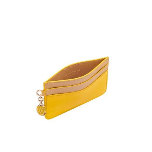 Serpenti Forever card holder in gold Urban grain calf leather. Captivating snakehead charm in light gold-plated brass embellished with red enamel eyes. SEA-CC-HOLDER-CLa image 2