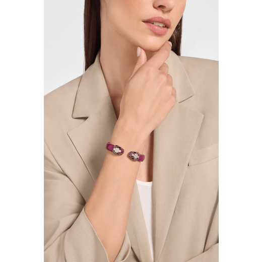 Serpenti Forever bangle bracelet in palladium-plated brass with midnight plum Pure karung inserts. Captivating contraire snakehead motif embellished with burgundy and white enamel scales, and black enamel eyes. BRAC-CONTR-PUREKAR image 1
