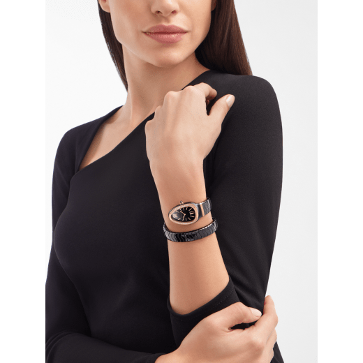 Serpenti Spiga single spiral watch with black ceramic case, 18 kt rose gold bezel set with brilliant cut diamonds, black lacquered dial, black ceramic bracelet with 18 kt rose gold elements. 102532 image 1