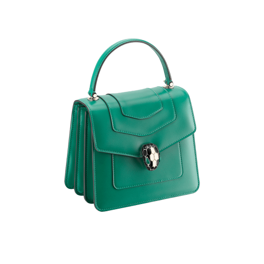 “Serpenti Forever ” top-handle bag in Lavender Amethyst lilac calf leather with Reef Coral red grosgrain inner lining. Iconic snakehead closure in light gold-plated brass embellished with black and white agate enamel and green malachite eyes. 1122-CLa image 2