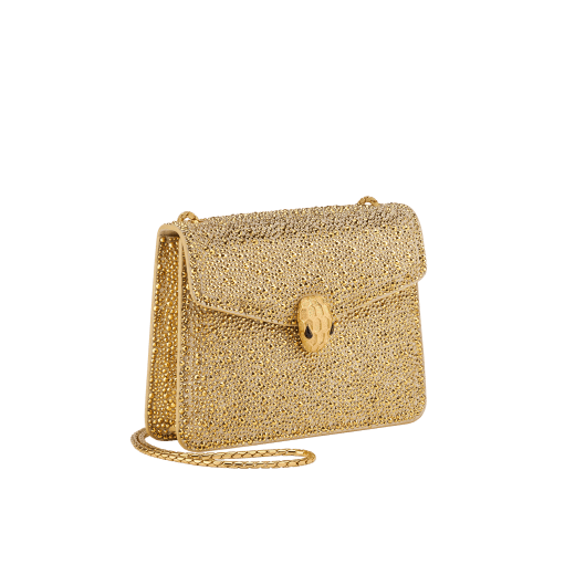 Serpenti Forever small crossbody bag in natural suede with different-size gold crystals and black nappa leather lining. Captivating magnetic snakehead closure in gold-plated brass embellished with "diamantatura" engraving on the scales, and black onyx eyes. 292889 image 2