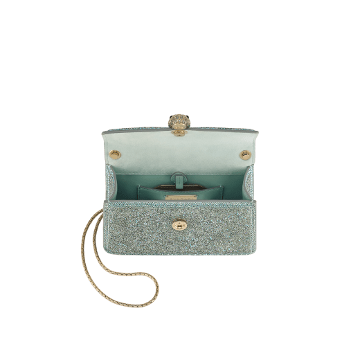 Serpenti Forever mini crossbody bag in natural suede with different-size gold crystals and black nappa leather lining. Captivating magnetic snakehead closure in gold-plated brass embellished with "diamantatura" engraving on the scales and black onyx eyes. 986-CDS image 4