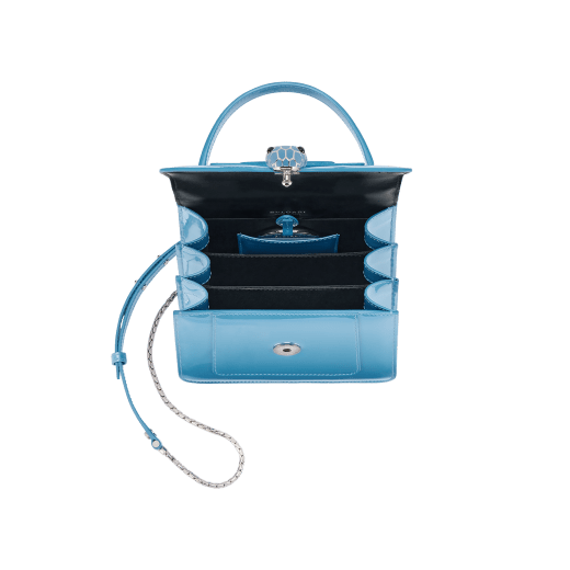 Serpenti Forever top handle bag in Niagara sapphire blue varnished calf leather with black gros grain lining. Captivating snakehead closure in palladium-plated brass embellished with matt Niagara sapphire blue enamel scales and black onyx eyes. 291322 image 4