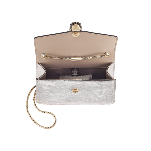 Serpenti Forever small crossbody bag in silver Molten lizard skin with foggy opal grey nappa leather lining. Captivating snakehead magnetic closure in light gold-plated brass embellished with black enamel and light gold-plated brass scales, and black onyx eyes. 293341 image 4