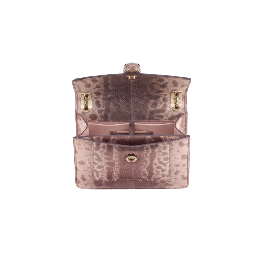 Serpenti Forever Day-to-Night small shoulder bag in Laguna blue shiny karung Cabochon skin with metal studs and black nappa leather lining. Captivating snakehead magnetic closure in light gold-plated brass embellished with bright Laguna blue enamel and light gold-plated brass scales, and black onyx eyes. SEA-1281-P image 4