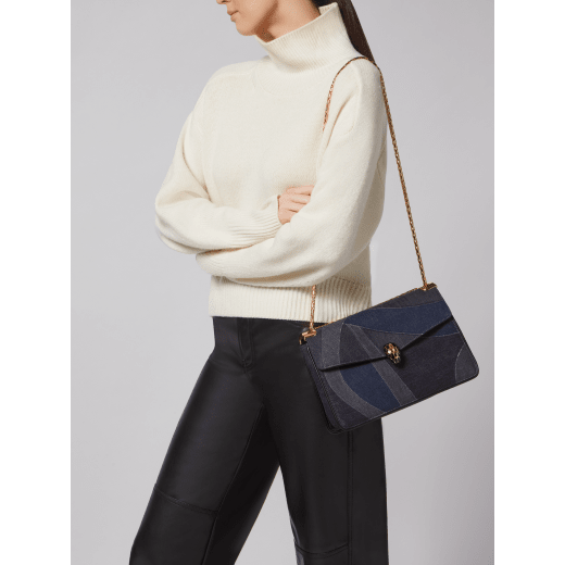 Serpenti Forever large shoulder bag in blue Patch Denim with emerald green nappa leather lining. Captivating snakehead magnetic closure in gold-plated brass embellished with black enamel and gold-plated brass scales, and black onyx eyes. 293464 image 3