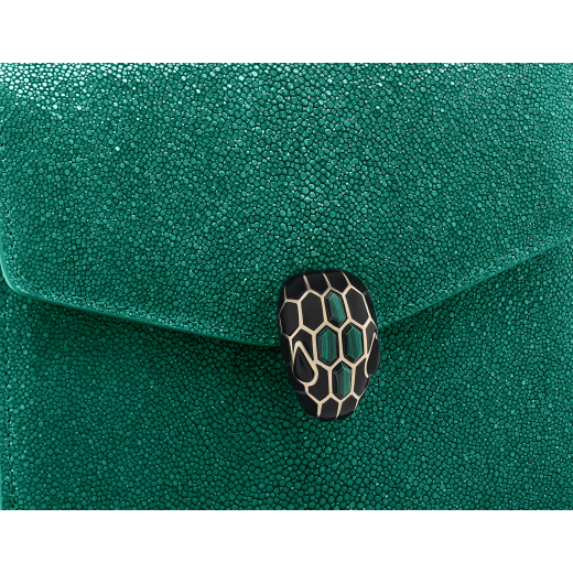 Serpenti Forever top handle bag in gold galuchat skin with black nappa leather lining. Captivating snakehead closure in gold-plated brass embellished with satin-gold scales and black onyx eyes. 752-FG image 5