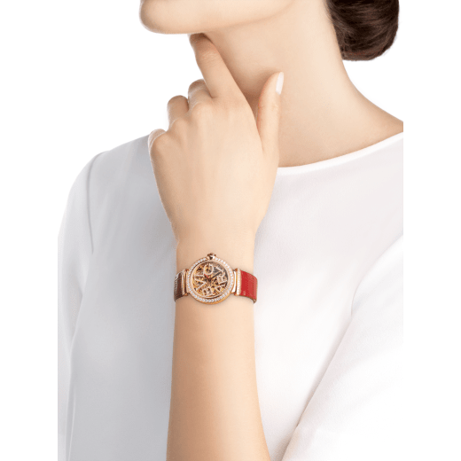 LVCEA Skeleton watch with mechanical manufacture movement, automatic winding, 18 kt rose gold case set with diamonds, openwork BVLGARI logo dial set with diamonds and red alligator bracelet 102833 image 5