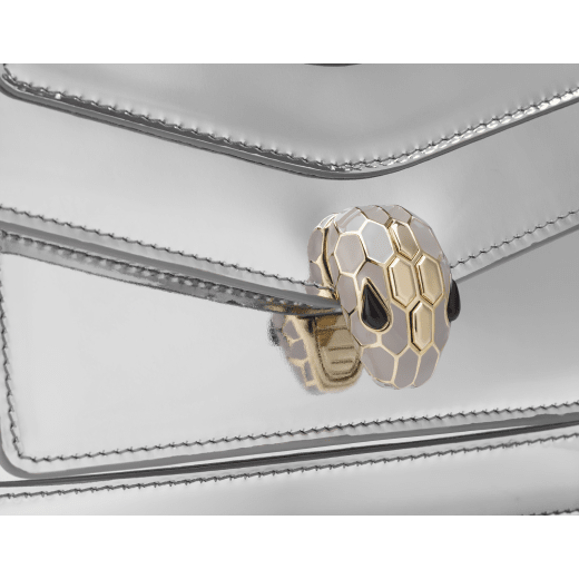 Serpenti Forever East-West small shoulder bag in black Shiny Brushed calf leather with black nappa leather lining. Captivating snakehead magnetic closure in dark ruthenium-plated brass embellished with black enamel and dark ruthenium-plated brass scales, and black onyx eyes. 1237-CLd image 5