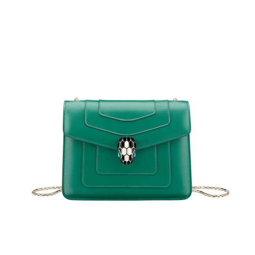 Serpenti Forever small crossbody bag in emerald green calf leather with amethyst purple grosgrain lining. Captivating snakehead closure in light gold-plated brass embellished with black and white agate enamel scales and green malachite eyes. 422-CLa image 1