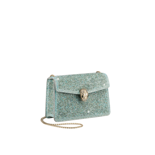 Serpenti Forever mini crossbody bag in natural suede with different-size gold crystals and black nappa leather lining. Captivating magnetic snakehead closure in gold-plated brass embellished with "diamantatura" engraving on the scales and black onyx eyes. 986-CDS image 2