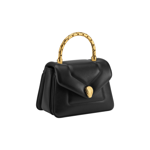 Serpenti Reverse small top handle bag in black quilted Metropolitan calf leather with black nappa leather lining. Captivating snakehead magnetic closure in gold-plated brass embellished with red enamel eyes. 1234-MCL image 2