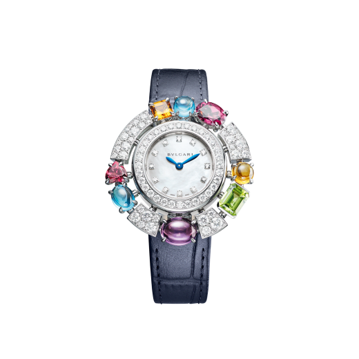 ALLEGRA Lady Watch 36 mm 18 kt white gold case, set with diamonds and 3 mixed shape cut citrines purple and yellowish orange and amethysts, 3 shape cut green peridot and blue topaze, 2 mixed cut rhodolites. Mother of pearl dial, set with diamonds indexes. Total precious metal weight 40.10 grs Blue alligator strap with stiches with white gold set ardillon buckle. Quartz movement caliber B033 customized and decorated with Bulgari logo. hours, minutes functions. water proof 30 m. 103499 image 1