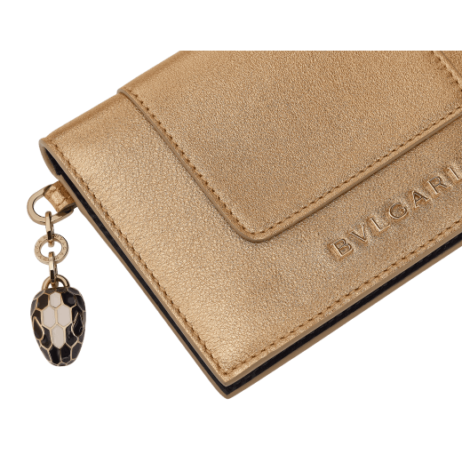 Serpenti Forever folded card holder in coral carnelian orange calf leather with flamingo quartz pink nappa leather interior. Captivating light gold-plated brass snakehead charm with red enamel eyes, and press-stud closure. SEA-CC-HOLDER-FOLD-CLb image 4