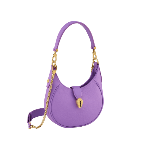 Serpenti Ellipse small crossbody bag in Urban grain and smooth ivory opal calf leather with flamingo quartz pink gros grain lining. Captivating snakehead closure in gold-plated brass embellished with black onyx scales and red enamel eyes. 1204-UCLa image 2