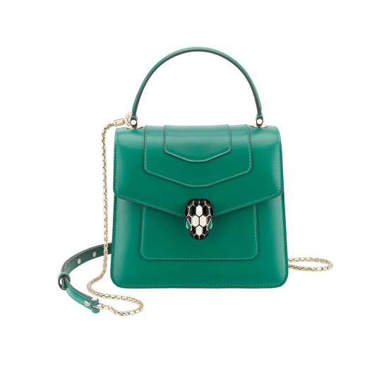 Serpenti Forever small top handle bag in white agate calf leather with heather amethyst fuchsia grosgrain lining. Captivating snakehead closure in light gold-plated brass embellished with black and white agate enamel scales and green malachite eyes. 1122-CLa image 1