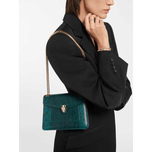 Serpenti Forever Day-to-Night small shoulder bag in light amethyst pure karung with light amethyst nappa leather lining. Captivating snakehead magnetic closure in gold-plated brass embellished with light amethyst enamel and gold-plated brass scales, and black onyx eyes. SEA-001-1281S-KAR image 1