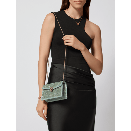Serpenti Forever mini crossbody bag in natural suede with different-size gold crystals and black nappa leather lining. Captivating magnetic snakehead closure in gold-plated brass embellished with "diamantatura" engraving on the scales and black onyx eyes. 986-CDS image 1