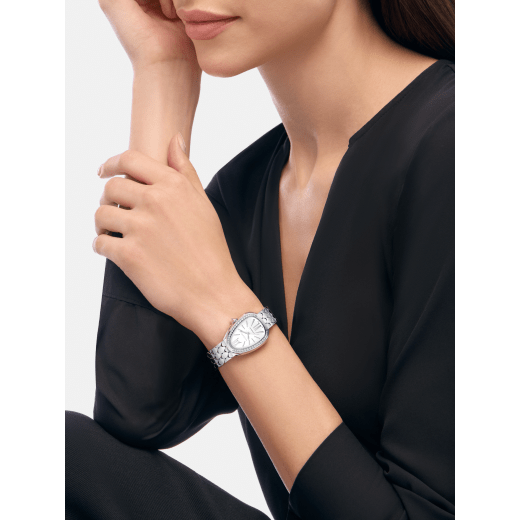 Serpenti Seduttori automatic watch in stainless steel with diamond-set bezel and white opaline dial. Water-resistant up to 30 metres 104060 image 1