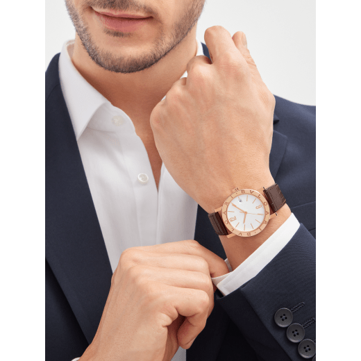 Bvlgari Bvlgari watch with mechanical automatic in-house movement, 18 kt rose gold case and bezel engraved with double logo, white opaline dial and brown alligator bracelet. Water-resistant up to 50 metres 103968 image 1