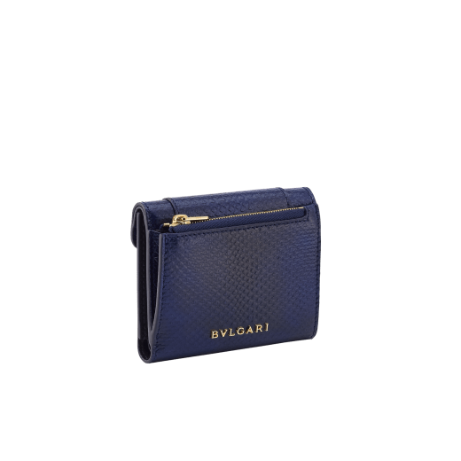 Serpenti Forever compact wallet in shiny midnight plum karung with black nappa leather interior. Captivating snakehead press-button closure in palladium-plated brass embellished with midnight plum enamel and palladium-plated brass scales and black enamel eyes. SEA-SLIM-COMPACT-R-kar image 3