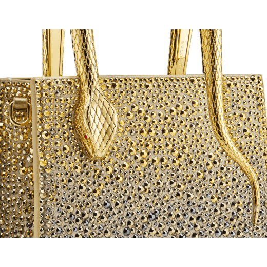 Serpentine mini tote bag in natural suede with different-size degradé gold crystals and black nappa leather lining. Captivating snake body-shaped handles in gold-plated brass embellished with engraved scales and red enamel eyes. 292824 image 5